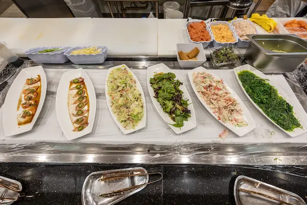 Cold Salads and Seaweed on Buffet Line